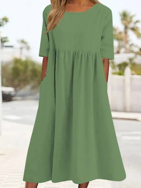 New cotton and linen casual short-sleeved pocket pleated loose round neck dress m300890