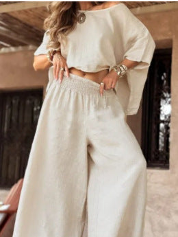 Solid color explosive casual loose round neck off-the-shoulder summer women's suit m302330